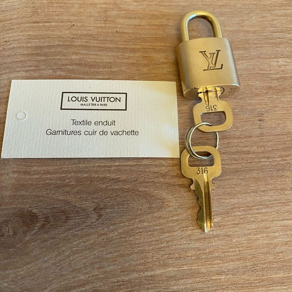 Authentic Louis Vuitton lock and keys set